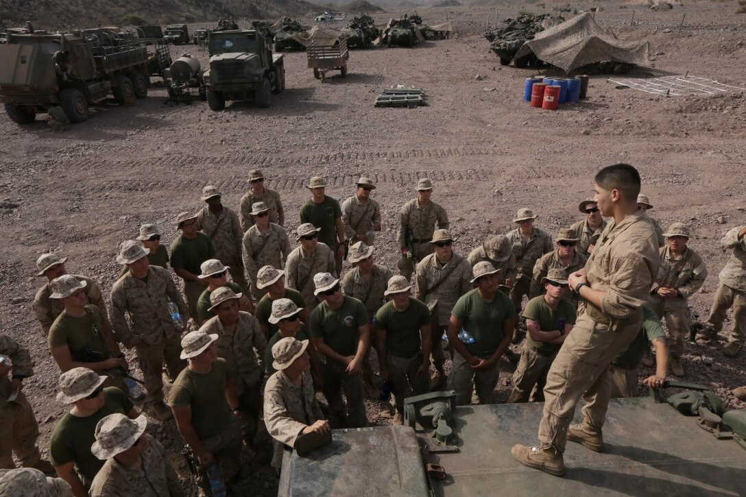 ARTA BEACH, Djibouti (July 24, 2015). U.S. Marine Sgt. Carlos Guerrero teaches the Marines of Battalion Landing Team 3rd Battalion, 1st Marine Regiment, 15th Marine Expeditionary Unit, about the functions of an M1A1 Abrams tank. Guerrero is a tank commander with BLT 3/1, 15th MEU.   Elements of the 15th Marine Expeditionary Unit are ashore in Djibouti for sustainment training to maintain and enhance the skills they developed during their pre-deployment training period.  The 15th MEU is currently deployed in support of maritime security operations and theater security cooperation efforts in the U.S. 5th and 6th Fleet areas of operation. (U.S. Marine Corps photo by Sgt. Jamean Berry/Released)