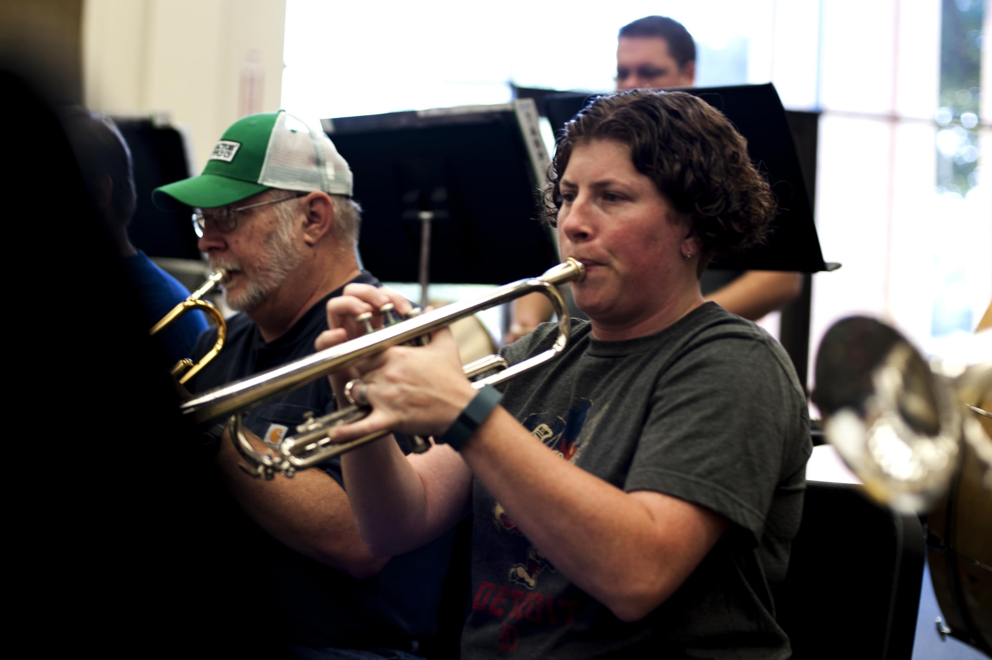 Kristin M. Ellis, Central High School assistant band director, practices her trumpet during band practice in the band hall at Angelo State University, San Angelo, Texas, July 28, 2015. The San Angelo Community band, founded 26 years ago, made up of various people from all backgrounds and ages, including military members retired and active. (U.S. Air Force photo by Senior Airman Scott Jackson/Released)
