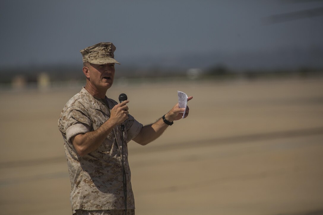 Col. Anthony Bianca, former commanding officer of Marine Aircraft Group (MAG) 16, speaks to Marines and guests during the MAG-16 change of command ceremony aboard Marine Corps Air Station Miramar, California, July 30. Bianca relinquished command of the group to Col. Chad Blair. (U.S. Marine Corps photo by Sgt. Brian Marion/Released)