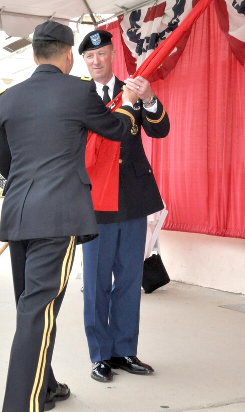 Brig. Gen. Mark Toy, commander of the Corps’ South Pacific Division, placed the Corps of Engineers flag into Gibb’s hands at the ceremony. 

In military tradition, passing the flag represents the transfer of command.

The change of command ceremony today was held at the Community Center, Fort MacArthur, in San Pedro, California.

Col. Kim Colloton relinquished command to Col. Kirk Gibbs during this traditional Army ceremony.

 Gibbs took command following an assignment as assistant deputy operations director within the National Military Command Center at the Pentagon. He is the 61st commander of the District.
 
"To the employees of the District...," said Gibbs, " I will give you nothing less than my very best for the next three years, that is my commitment to you."