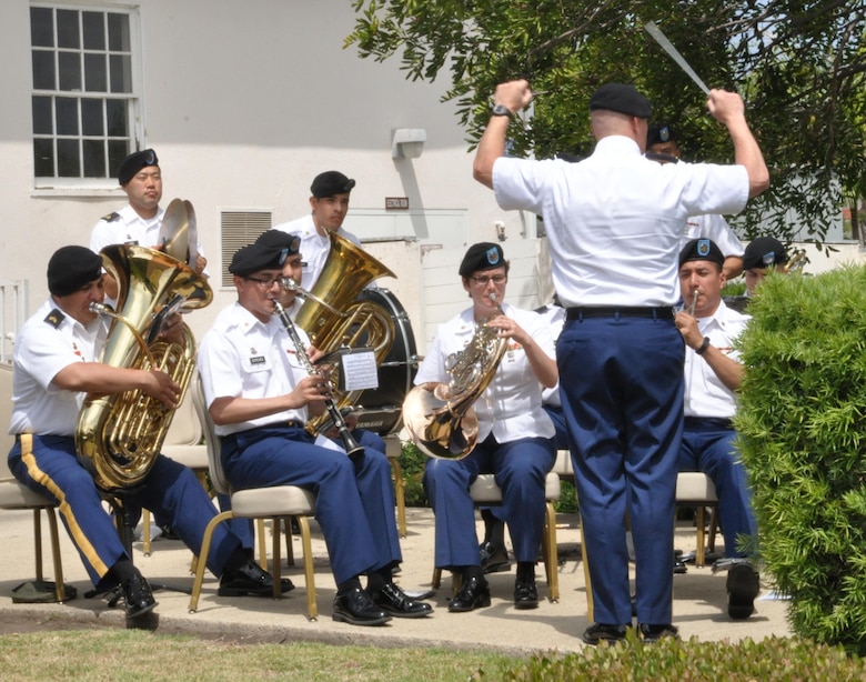 The 300th Army Band from Bell, California, under the direction of Chief Warrant Officer Jeff Smith played in today's formal change of command ceremony held July 31 at the Community Center at Fort Mac Arthur in San Pedro, Calif.