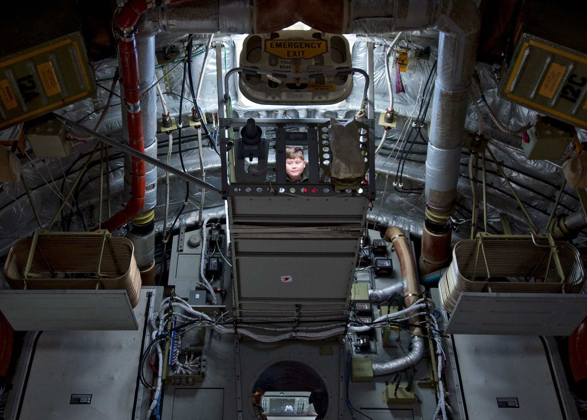 Pilot For A Day Eddie Paul Bearb tours a C-17 as part of his first day as a member of the 535th Airlift Squadron at Joint Base Pearl Harbor-Hickam, Hawaii, July 30, 2015. The Pilot For A Day program was created to provide children with serious or chronic conditions the opportunity to experience life as an honorary pilot. (U.S. Air Force photo by 2nd Lt. Kaitlin Daddona/Released)