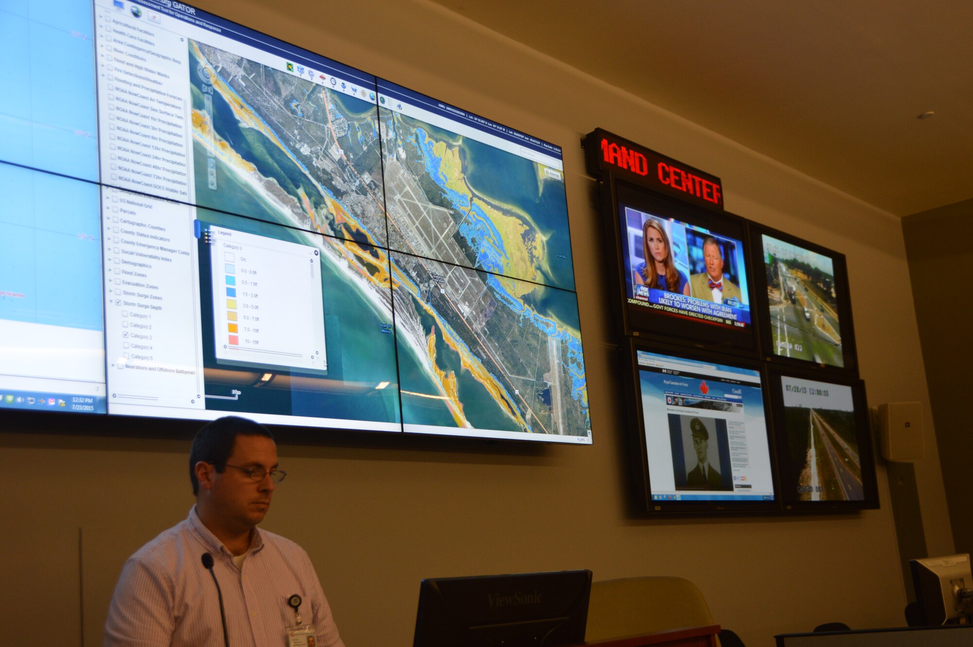 Scott Warner, a public safety geographic-information systems/911 specialist, brings up a computer view of Panama City Beach in the operations room of the Bay County Emergency Operations Center. Warner brought up the view during a tour of visitors from Continental U.S. Aerospace Defense Command Region – 1st Air Force (Air Forces Northern). The group, from Tyndall Air Force Base, Fla., visited the center in Southport, Fla., to learn more about how Bay County officials conduct contingency operations. (Air Force photo released/Mary McHale)