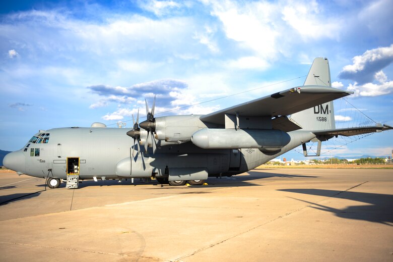 An EC-130H Compass Call from the 41st Electronic Combat Squadron waits on the flightline to taxi at Davis-Monthan Air Force Base, Ariz., July 15, 2015. The 41st ECS provides war-fighting commanders with combat ready EC-130H Compass Call aircraft and aircrews trained to execute electronic attack and information warfare strategy. (U.S. Air Force photo by Airman 1st Class Cheyenne Morigeau/Released)