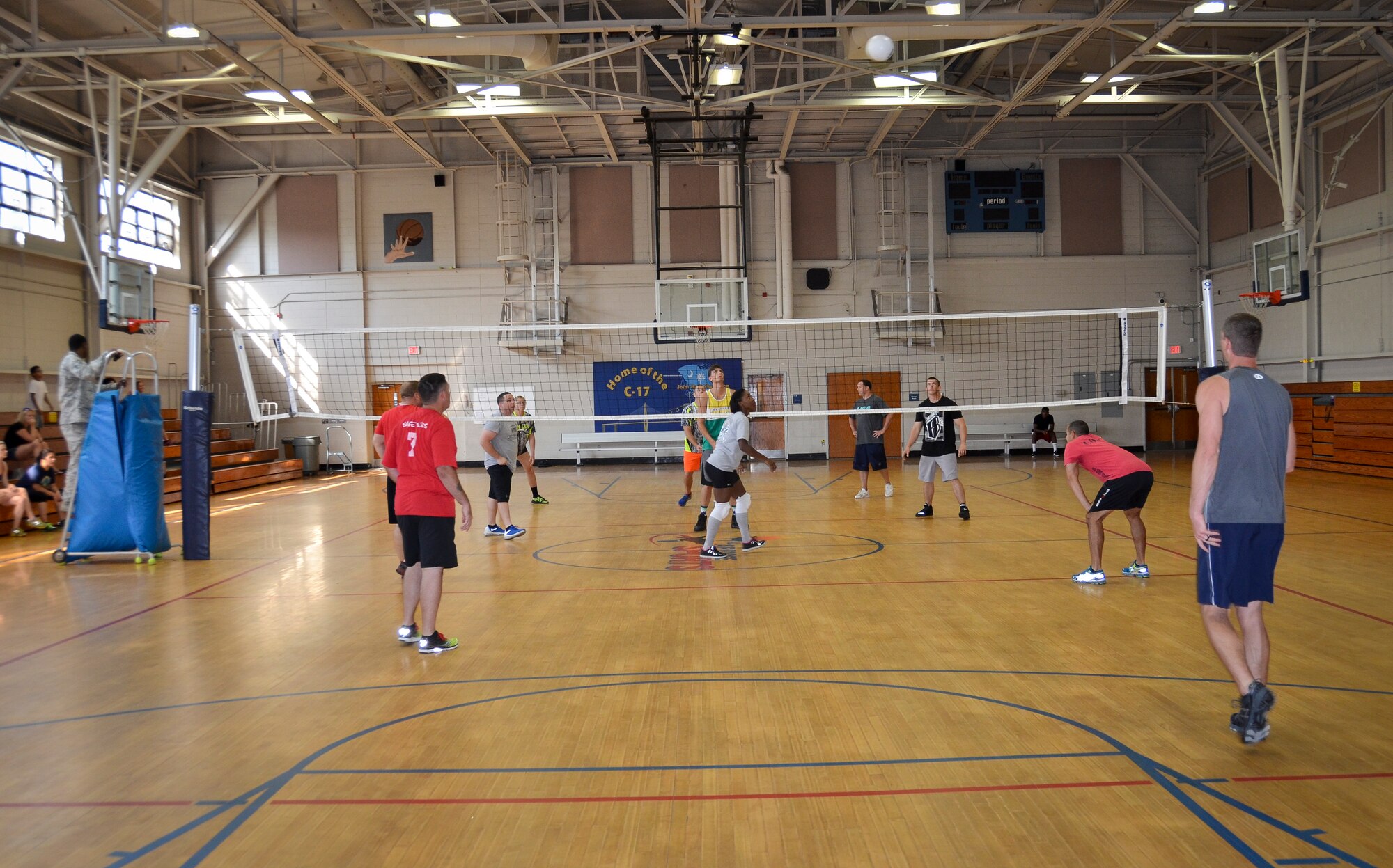 The 628th Security Forces Squadron team serves the ball during the Intramural Volleyball Season Opener against the 1st Combat Camera Squadron, July 30, 2015 at Joint Base Charleston – Air Base, S.C. 628th SFS defeated 1st CTCS with scores of: 25-10, 22-25 and 15-5. The Volleyball season is expected to run until mid-September. (U.S. Air Force photo/Staff Sgt. AJ Hyatt)