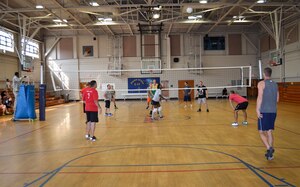 The 628th Security Forces Squadron team serves the ball during the Intramural Volleyball Season Opener against the 1st Combat Camera Squadron, July 30, 2015 at Joint Base Charleston – Air Base, S.C. 628th SFS defeated 1st CTCS with scores of: 25-10, 22-25 and 15-5. The Volleyball season is expected to run until mid-September. (U.S. Air Force photo/Staff Sgt. AJ Hyatt)