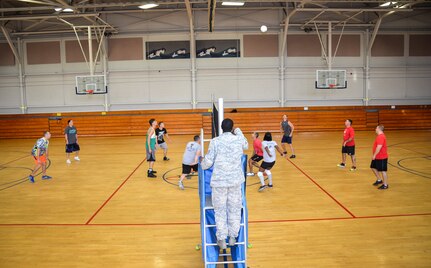 The 1st Combat Camera Squadron and the 628th Security Forces Squadron compete during the Intramural Volleyball Season Opener, July 30, 2015 at Joint Base Charleston – Air Base, S.C. 628th SFS defeated 1st CTCS with scores of: 25-10, 22-25 and 15-5. The Volleyball season is expected to run until mid-September. (U.S. Air Force photo/Staff Sgt. AJ Hyatt)