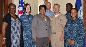 Cutline: Staff members of the Naval Health Clinic Charleston wellness committee pose for a photo. NHCC recently earned the Gold Star, 2014 Blue-H – Navy Surgeon General’s Health Promotion and Wellness Award. Front row, from left to right: Rhonda Mitchellketchens, NHCC Wellness Clinic medical support assistant; Lt. Nikki Pritchard, NHCC Sexual Assault Prevention and Response program coordinator; Linda Washington, NHCC clinical nutritionist and Wellness coordinator; Capt. Danny Denton, director, NHCC Public Health Services, and Petty Officer 2nd Class Janay House, leading petty officer, NHCC Human Resources Department. Back Row: Dr. Scott Berry, NHCC psychologist; and Chief Hospital Corpsman Naji Mohammed, NHCC Alcohol and Drug Abuse Prevention officer. 