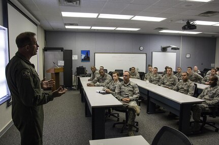 Chief Master Sgt. Bryan DuBois, 317th Airlift Squadron loadmaster superintendent, shares his Air Force Reserve story with a group of Air Force chaplain candidates who visited Joint Base Charleston this week. The 315th Airlift Wing Chaplain Service hosted the 18 second lieutenants in an effort to tell the young officers about the opportunities available to them as Air Force Reserve chaplains. Besides meeting Reserve and active duty Airmen around the base, the group also visited patients at the Charleston VA Medical Center. Over the weekend they were scheduled to participate in the Joint Base Charleston Chapel services with active duty chaplains on the main base and over at the Naval Weapons Station. Weather permitting, they also hope to get a chance to visit the “Holy City's” many historical churches before departing the area. (U.S. Photo by Michael Dukes) 
