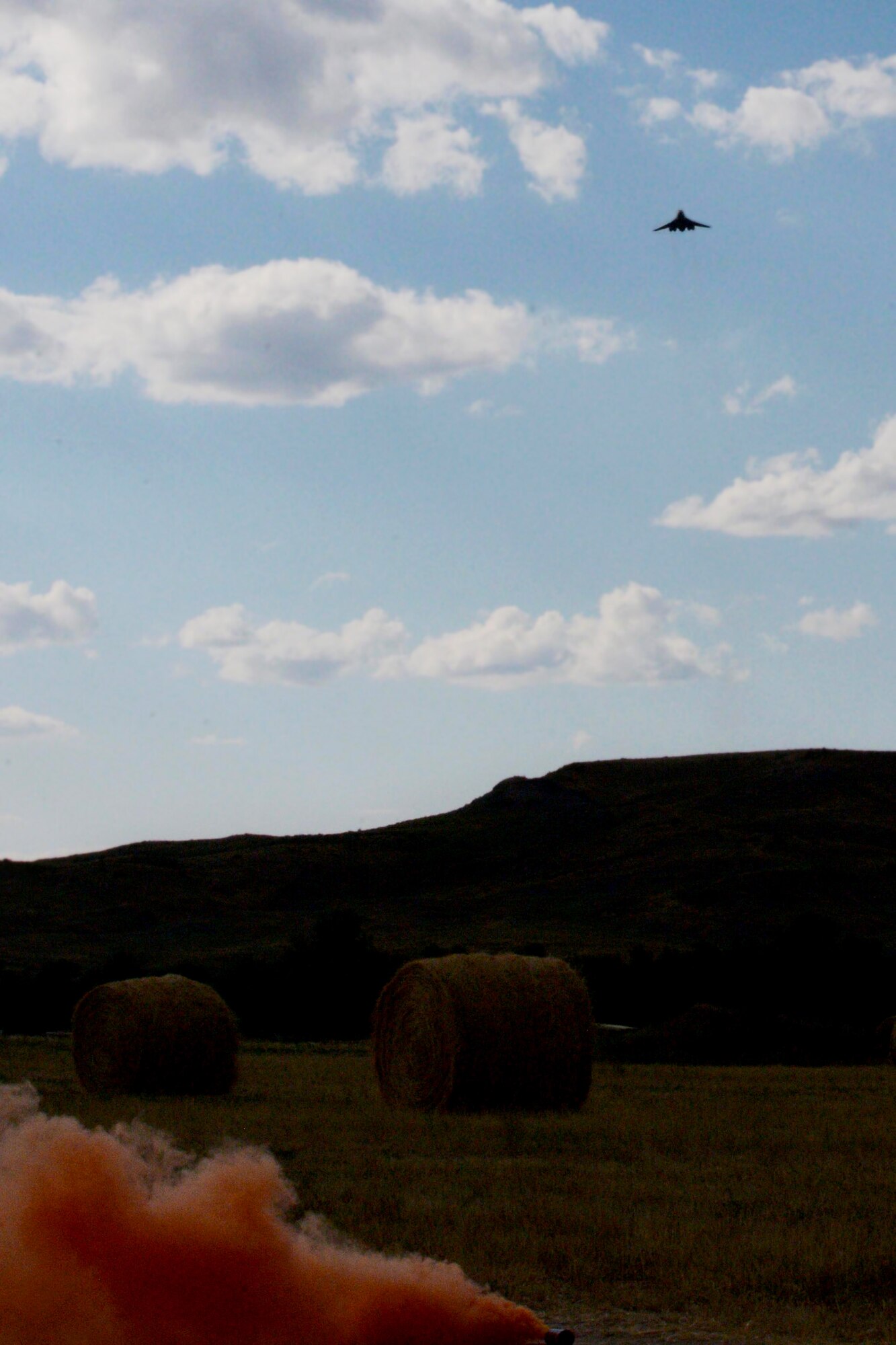 A B-1 bomber executes a show of force during a close air support exercise in a training area near Alzada, Mont., July 20, 2015. While deployed, B-1 bombers provide support to Airmen on the ground by executing close air support missions. (U.S. Air Force photo by Senior Airman Rebecca Imwalle/Released)