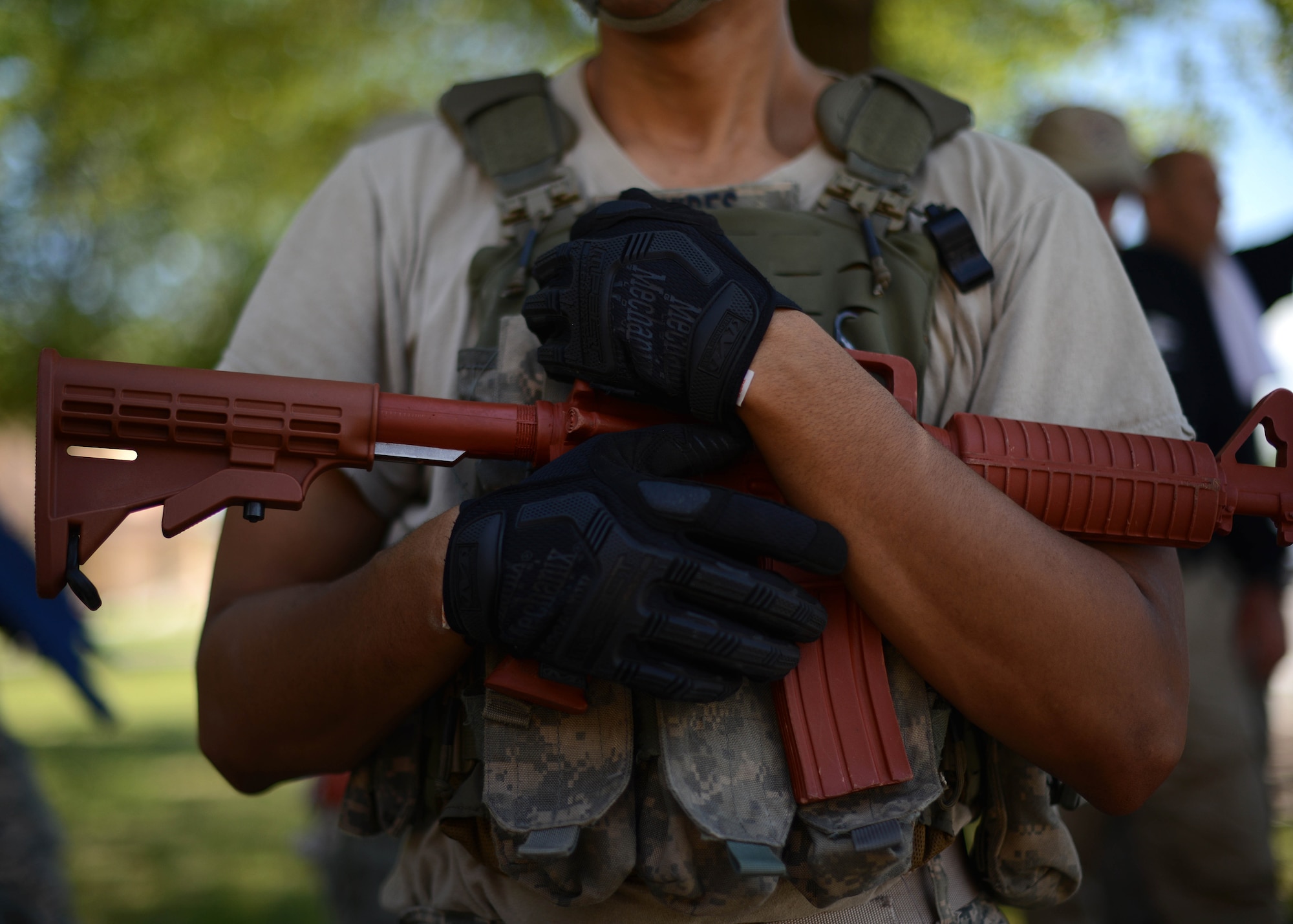 A U.S. Air Force Airman with the 31st Security Forces Squadron prepares to clear a room in an abandoned building July 30, 2015, at Aviano Air Base, Italy.  Approximately 20 defenders trained on breaching, clearing and other defensive and offensive tactics to prepare them for real-life situations. (U.S. Air Force photo by Staff Sgt. Evelyn Chavez/Released)