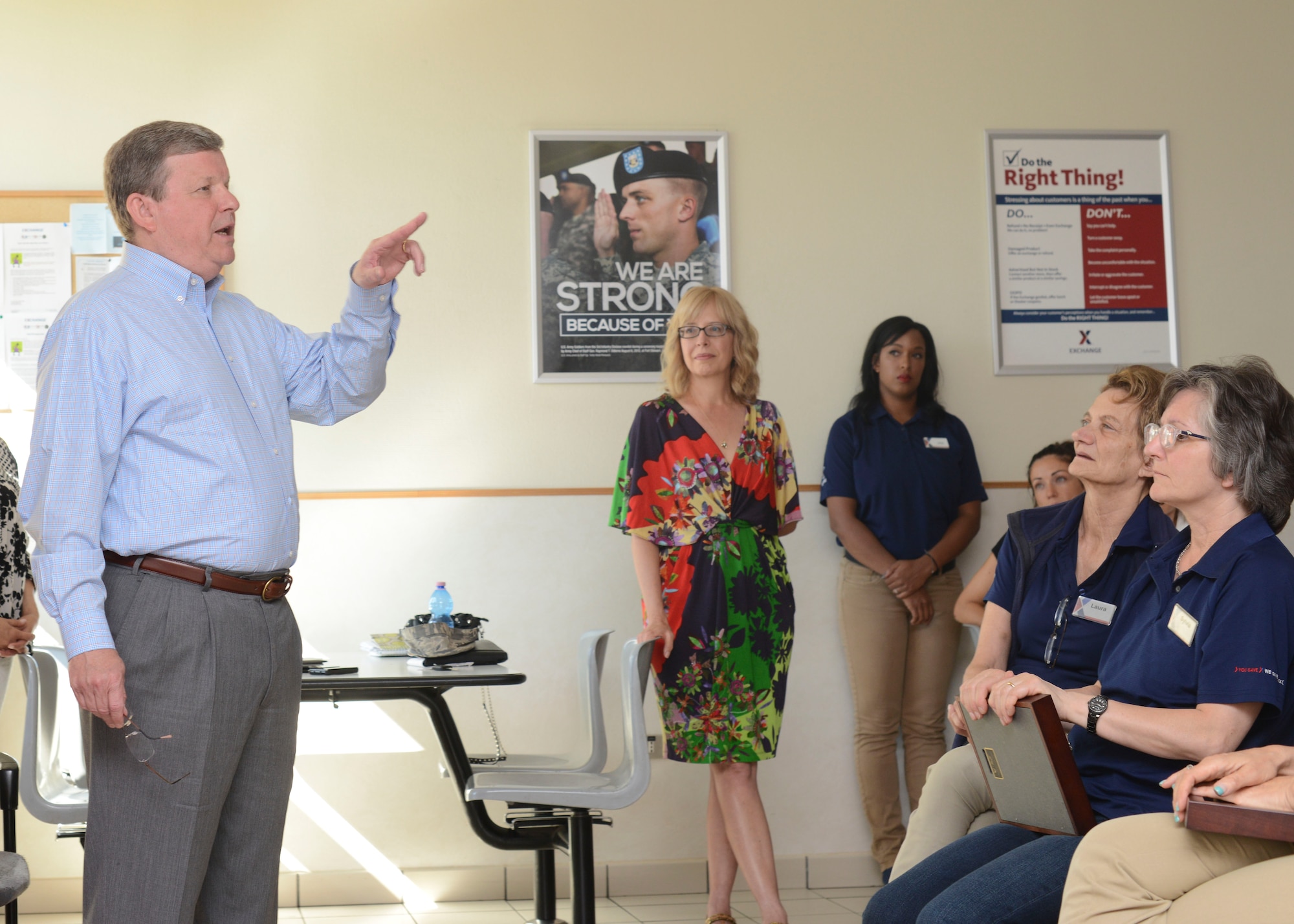 Tom Shull, Army and Air Force Exchange Service director, speaks with AAFES employees, July 31, 2015 at Aviano Air Base, Italy. He addressed how the Exchange can better serve the community, including increasing its assortment of name-brand merchandise in-store and online. (U.S. Air Force photo by Senior Airman Austin Harvill/Released)