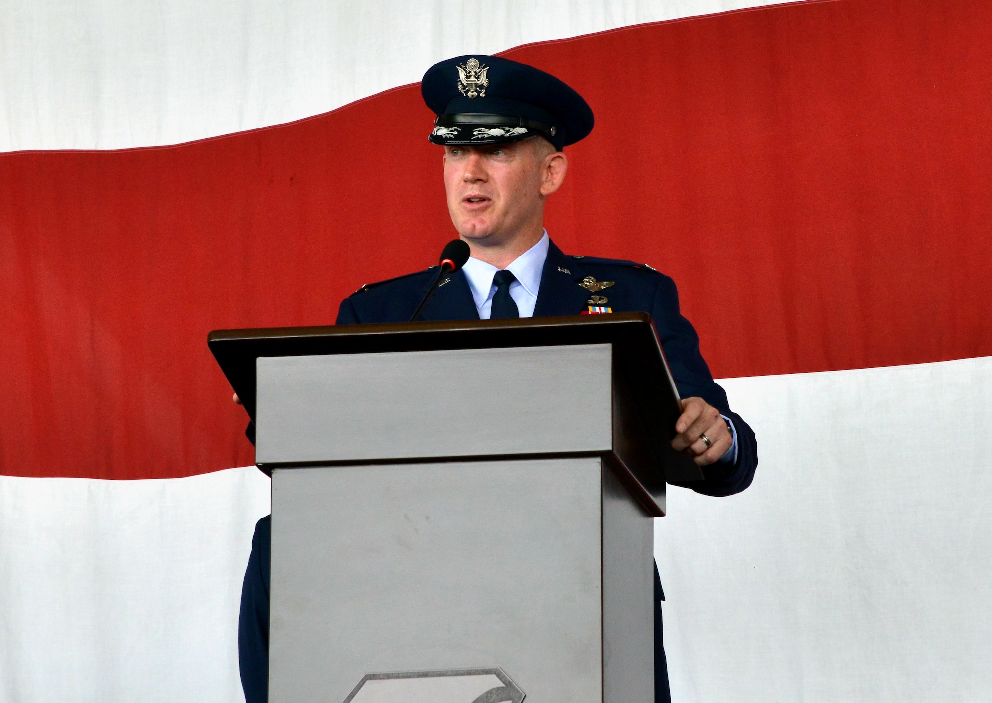 Col. John Walker, 39th Air Base Wing commander, speaks to Airmen during the wing's change of command ceremony July 31, 2015, at Incirlik Air Base, Turkey. The ceremony is a tradition in which authority and responsibility for a unit is transferred from one officer to another. Prior to coming to Incirlik AB, Walker served as the commander of the 8th Operations Group at Kunsan Air Base, Republic of Korea. (U.S. Air Force photo by Senior Airman Michael Battles/Released)