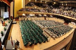 Air Force Gen. Craig R. McKinley, chief of the National Guard Bureau, addresses the 197 graduating cadets of the Louisiana National Guard’s Camp Minden Youth ChalleNGe Program at the Shreveport Municipal Auditorium, Jan. 22, 2011. The ceremony also commemorated 100,000 YCP graduates nationwide since its inception in 1993.