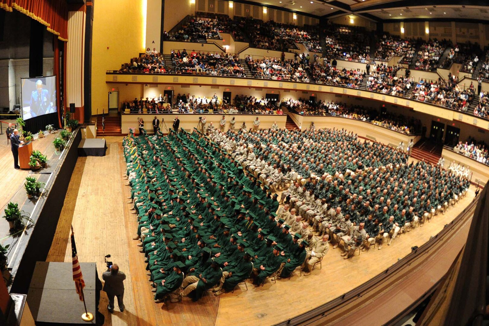 Air Force Gen. Craig R. McKinley, chief of the National Guard Bureau, addresses the 197 graduating cadets of the Louisiana National Guard’s Camp Minden Youth ChalleNGe Program at the Shreveport Municipal Auditorium, Jan. 22, 2011. The ceremony also commemorated 100,000 YCP graduates nationwide since its inception in 1993.