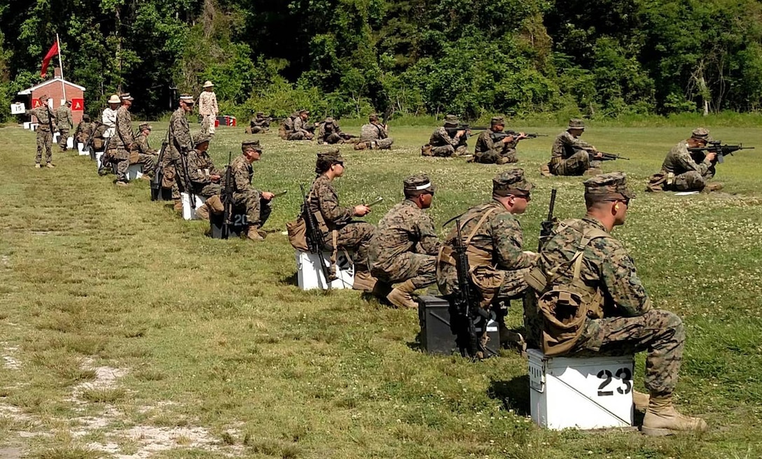 28 May 2015 – Marines, Combat Marksmanship Coaches (with white headbands), and Alpha Range Officials conduct the Qualification stage of Table 1A on Alpha Range, Stone Bay, Camp Lejeune.  The Marines are members of 2d Marine Logistics Group preparing for deployment with Special Purpose Marine Air Ground Task Force-South.
