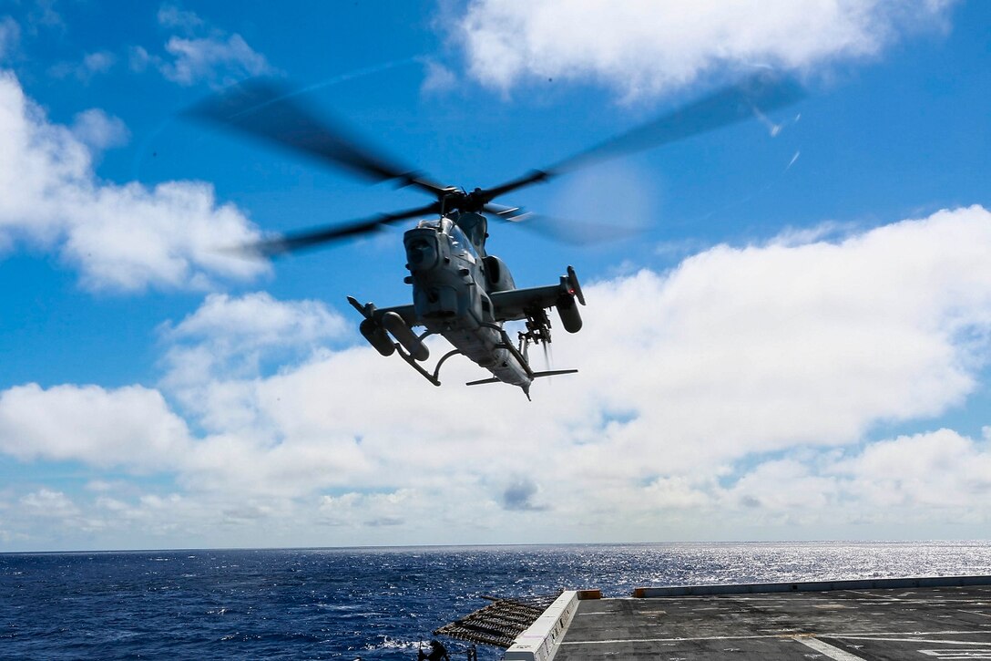 An AH-1Z Viper with Marine Medium Tiltrotor Squadron 161 (Reinforced), 15th Marine Expeditionary Unit, takes off from the USS Anchorage (LPD 23) at sea in the Pacific Ocean, May 27, 2015. The Marines and Sailors of VMM-161 (Rein.) practice their respective skills aboard the Anchorage to prepare for their next assignment while deployed.  (U.S. Marine Corps photo by Sgt. Jamean Berry/Released)