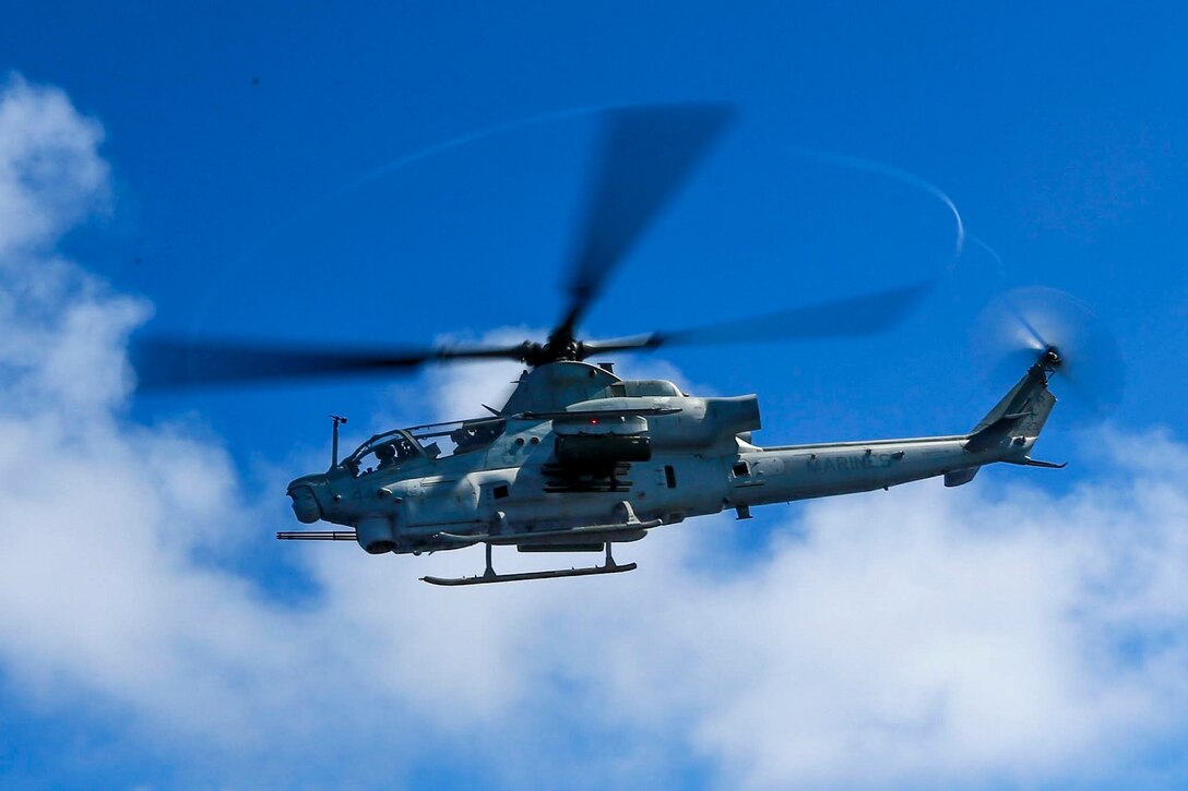 An AH-1Z Viper with Marine Medium Tiltrotor Squadron 161 (Reinforced), 15th Marine Expeditionary Unit, takes-off from the USS Anchorage (LPD 23) at sea in the Pacific Ocean, May 27, 2015. The Marines and Sailors of VMM-161 (Rein.) practice their respective skills aboard the Anchorage to prepare for their next assignment while deployed.  (U.S. Marine Corps photo by Sgt. Jamean Berry/Released)