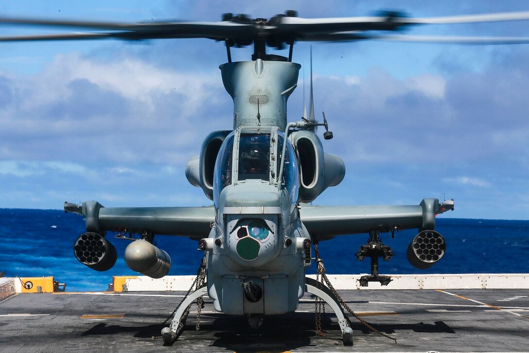 An AH-1Z Viper with Marine Medium Tiltrotor Squadron 161 (Reinforced), 15th Marine Expeditionary Unit, prepares for take-off aboard the USS Anchorage (LPD 23) at sea in the Pacific Ocean, May 27, 2015. The Marines and Sailors of VMM-161 (Rein.) practice their respective skills aboard the Anchorage to prepare for their next assignment while deployed.  (U.S. Marine Corps photo by Sgt. Jamean Berry/Released)