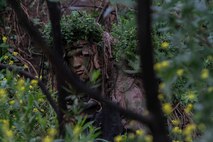 A Marine with 1st Marine Division, 7th Marine Regiment participates in stalking training aboard Marine Corps Base, Camp Pendleton, Calif., May 27, 2015. The training was the last event during Division School’s 6-week-long Pre-Scout Sniper Course. (Photo by LCpl. Danielle Rodrigues/Released)