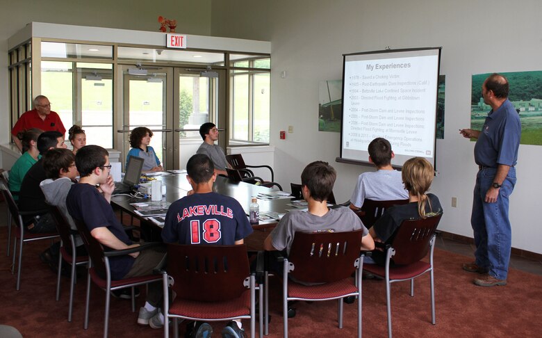 USACE Philadelphia District Dam & Levee Safety Program Manager Bruce Rogers (left) speaks with students from the Wallenpaupack High School Emergency Responders Club during a dam safety awareness event in May of 2015. 