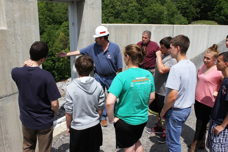 USACE Philadelphia District Dam & Levee Safety Program Manager Bruce Rogers conducts a tour with students from the Wallenpaupack High School Emergency Responders Club during a dam safety awareness event in May of 2015. 