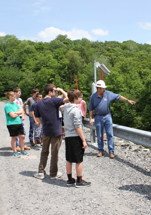 USACE Philadelphia District Dam & Levee Safety Program Manager Bruce Rogers conducts a tour with students from the Wallenpaupack High School Emergency Responders Club during a dam safety awareness event in May of 2015. 