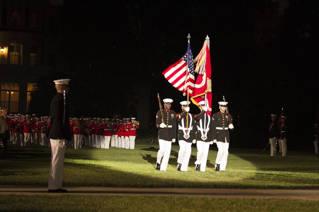 Marines from Marine Barracks Washington, D.C., perform during a Friday Evening Parade. May 29, 2015 (U.S. Marine Corps photo by Cpl. Skye Davis/ Released)