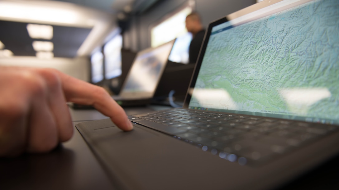 Brig. Gen Michael Groen, the director of Marine Corps Intelligence, tests the capabilities and functions of the new Tellus program to judge its effectiveness, May 29, 2015. Tellus can be used to instantly report new information to patrols and convoys without the use of radio.