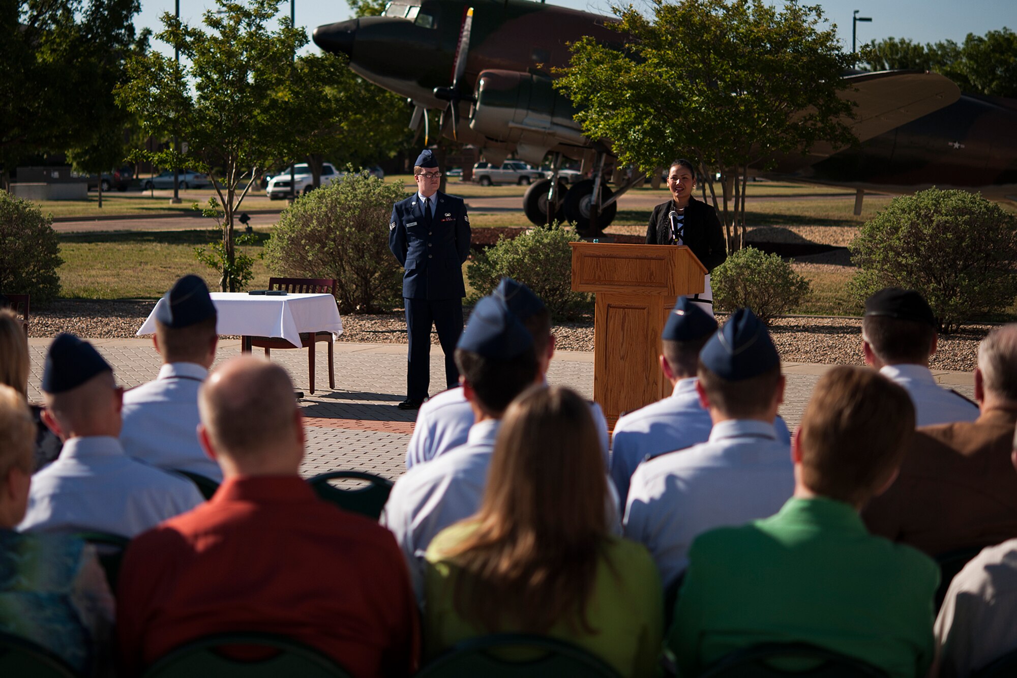 GOODFELLOW AIR FORCE BASE, Texas – Nita Clever gives a speech after receiving the Public Service Award during a ceremony in front of the Norma Brown Building April 30. The award recognized Clever and her husband for their distinguished service in recovering human remains from a Vietnam crash site to confirm the identities of seven of the CAP-72 crewmembers who were shot down by enemy forces over southern Laos in 1969, one of whom was Clever’s father-in-law. (U.S. Air Force photo/ Airman 1st Class Devin Boyer)