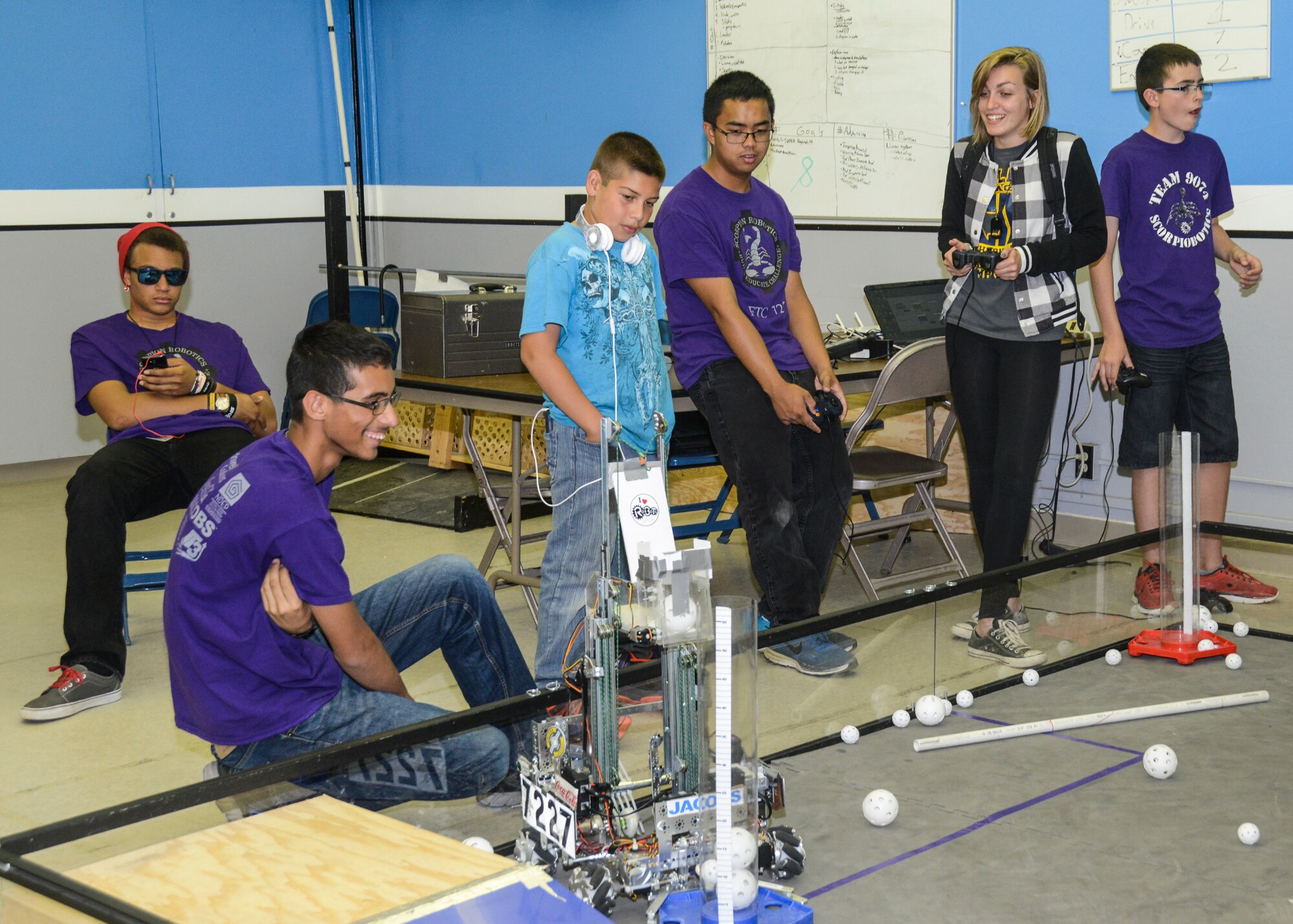 A potential team member tries out the controls at the Desert High School robotics open house May 27. (U.S. Air Force photo by Rebecca Amber)