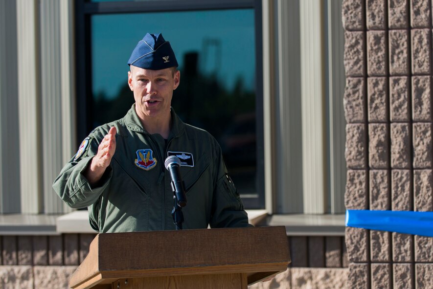 U.S. Air Force Col. Thomas Dorl, 347th Rescue Group commander, speaks during the HC-130J Combat King II Rescue Simulator Building dedication ceremony May 29, 2015, at Moody Air Force Base, Ga. The 71st Rescue Squadron will utilize the facility to train pilots on rescue capabilities. Training is scheduled to begin January 2016. (U.S. Air Force photo by Airman 1st Class Dillian Bamman/Released)