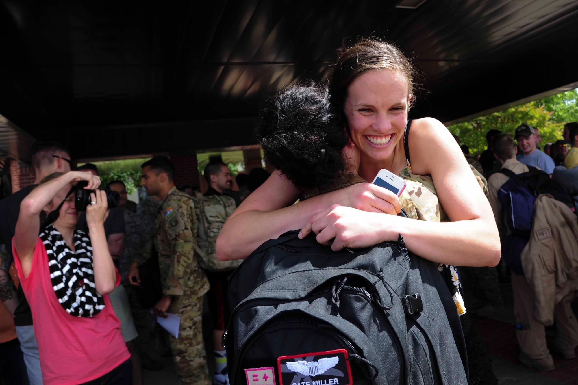 Approximately 50 Team Little Rock Airmen return home to their families and friends May 22, 2015 after supporting contingency operations in Southwest Asia. At any given time there are approximately 400 Airmen deployed from Little Rock Air Force Base. Team Little Rock Airmen specialize in combat airlift and expeditionary support down range. (U.S. Air Force photo by Senior Airman Kaylee Clark)
