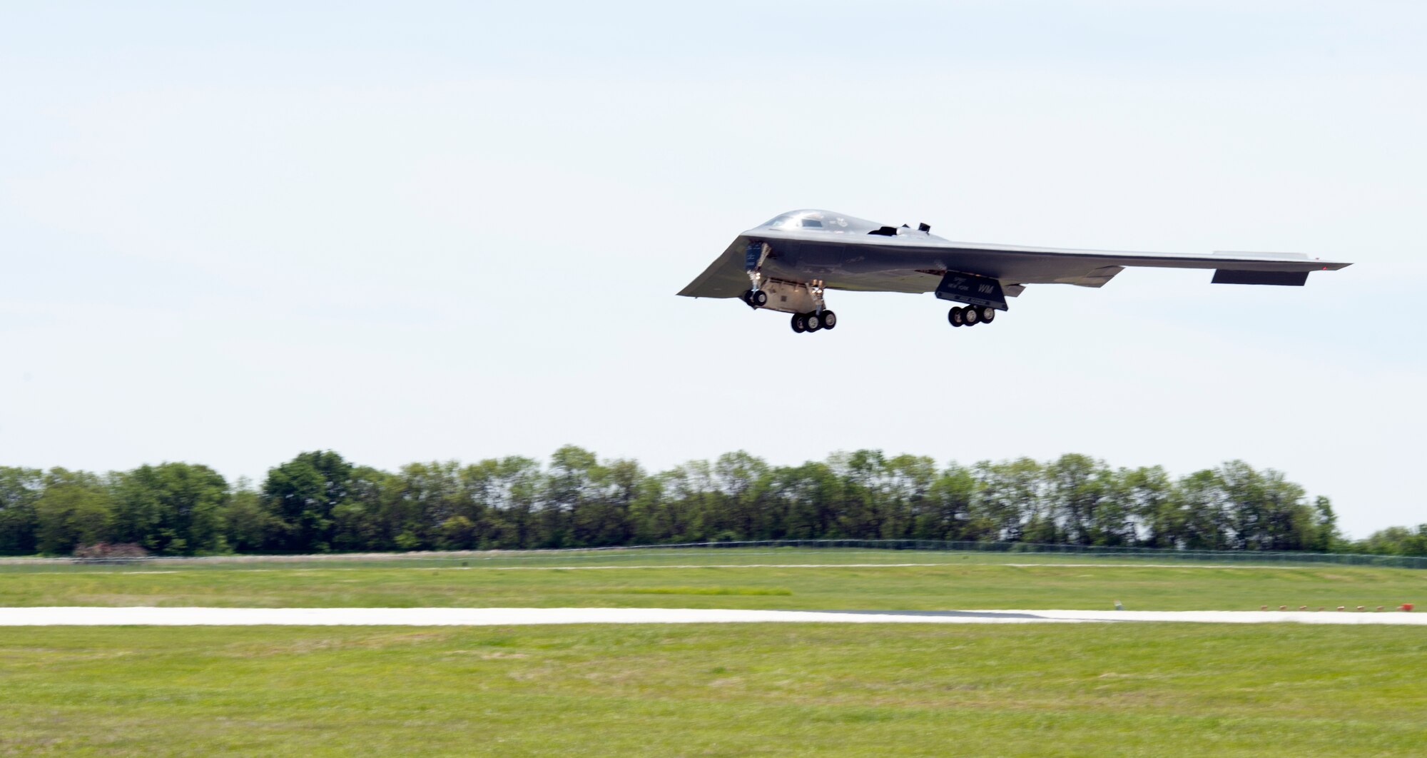 The Spirit of New York, a B-2 bomber assigned to the 509th Bomb Wing, lands at Whiteman Air Force Base, Mo., after conducting an end-to-end operational nuclear weapon systems evaluation May 19, 2015. The evaluation demonstrated the strategic bomber force's ability to prepare, load, fly and deliver nuclear-capable munitions. During the event, the B-2 flew to the Tonopah Test Range in Nevada and deployed two inert Joint Test Assembly munitions to simulate B-61-7 and B-83 gravity weapons. (U.S. Air Force photo by Staff Sgt. Brigitte N. Brantley/Released)