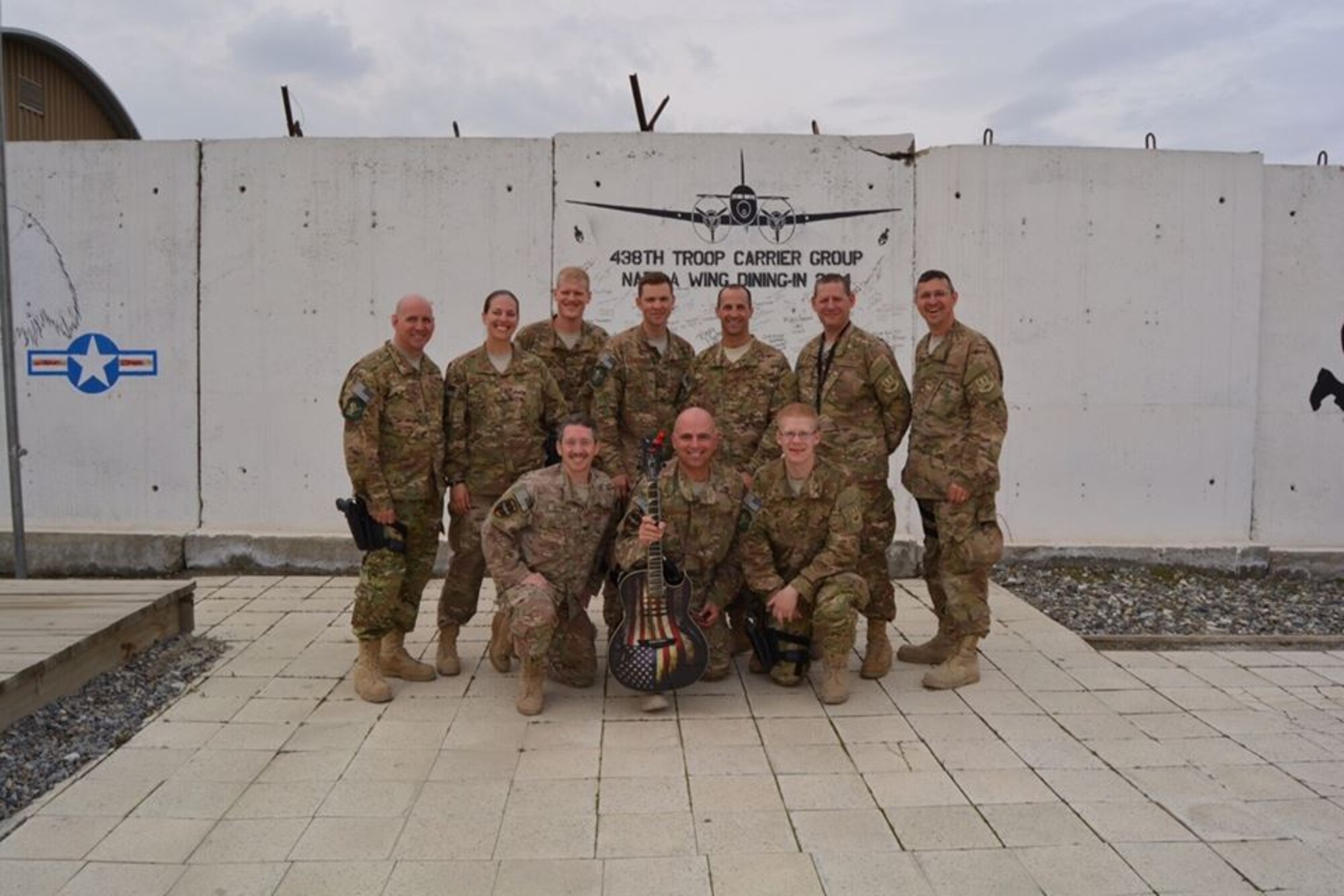 The AFCENT Band Nighthawk poses for a photo after an impromptu jam session at a forward-operating base near Kabul, Afghanistan. (U.S. Air Force photo/released)
