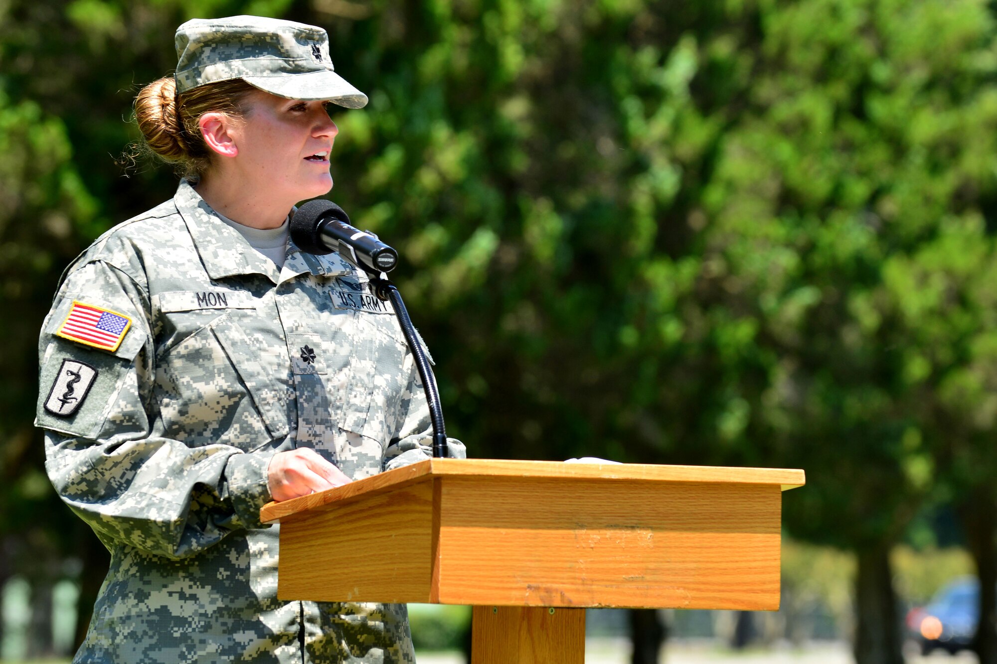 U.S. Army Lt. Col. Heidi Mon, McDonald Army Health Center commander, speaks to her new command during her assumption of command ceremony at Fort Eustis, Va., May 28, 2015. Before assuming command of MCAHC, Mon was previously the Evans Army Hospital troop commander in Fort Carson, Colo. (U.S. Air Force photo by Staff Sgt. Natasha Stannard/Released)