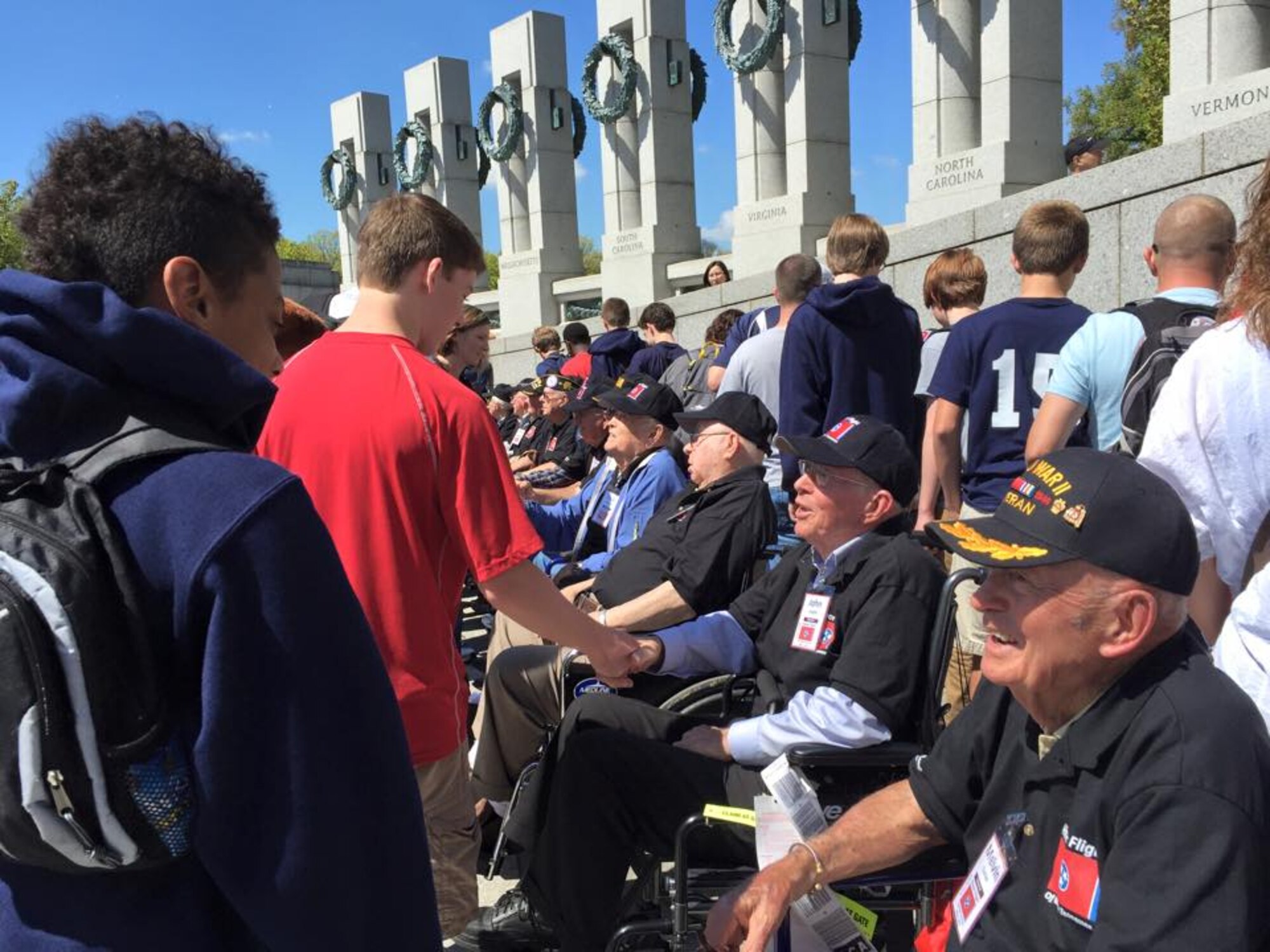 During the same time the World War II and Korean War veterans from this area were in Washington, D.C. as part of the Honor Flight of Middle Tennessee, students from the Columbia Academy of Columbia, Tenn., were also visiting. Pictured are the two groups together at the World War II Memorial.