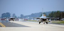 Republic of Korean Air Force F-16 Fighting Falcons from the 123rd Fighter Squadron lands after a training sortie at Kunsan Air Base, Republic of Korea, June 1, 2015. The U.S. remains committed to their regional Asia-Pacific partners and allies by providing a superior combat capability to ensure peace and stability. (U.S. Air Force photo by Staff Sgt. Nick Wilson/Released)