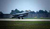 A Republic of Korean Air Force F-16 Fighting Falcon from the 123rd Fighter Squadron lands as part of a training sortie at Kunsan Air Base, Republic of Korea, June 1, 2015. ROKAF pilots routinely train with U.S. Air Force pilots in the Pacific region to promote regional stability, enhance U.S. alliances in the area, and provide a combat capable air component to U.S. Pacific Command, able to function in a variety of roles and responses. (U.S. Air Force photo by Staff Sgt. Nick Wilson/Released)