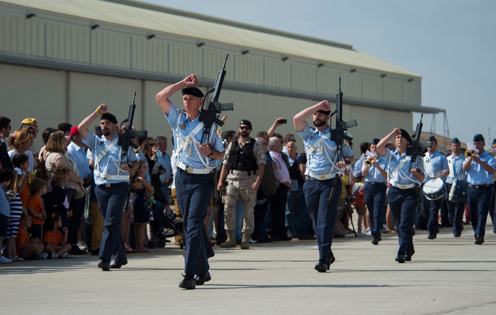 Members of the Spanish Air Force perform a pass and review during an open house Ma, 30, 2015, at Morón Air Base, Spain. The two-day event was held to celebrate Morón’s 75th anniversary. Participating units included the Spanish Air Force, U.S. Air Force 496th Air Base Squadron and Marine Corps Special-Purpose Marine Air-Ground Task Force Crisis Response-Africa. Visitors had the opportunity to see static displays from both countries’ armed forces, such as the Eurofighter Typhoon, P-3 Orion and MV-22B Osprey. (U.S. Air Force photo/Senior Airman Damon Kasberg)

