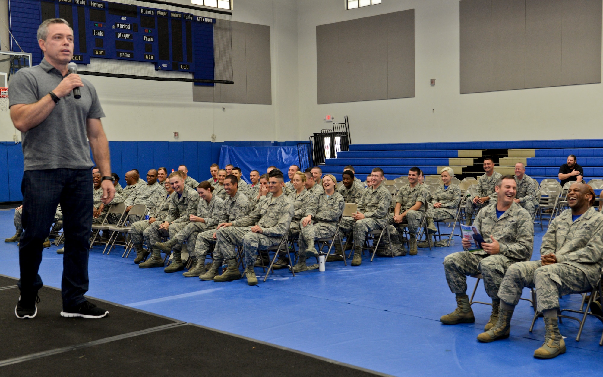 Comedian Bernie McGrenahan entertains Andersen Airmen during his “Comedy is the Cure” show May 29, 2015, at the Coral Reef Fitness Center on Andersen Air Force Base, Guam. The comedian uses jokes and humor, as well as a 30-minute testimony on what he’s been through to relay the importance on alcohol, drug and sexual assault prevention, and risk-reduction safety. (U.S. Air Force photo by Staff Sgt. Robert Hicks/Released)