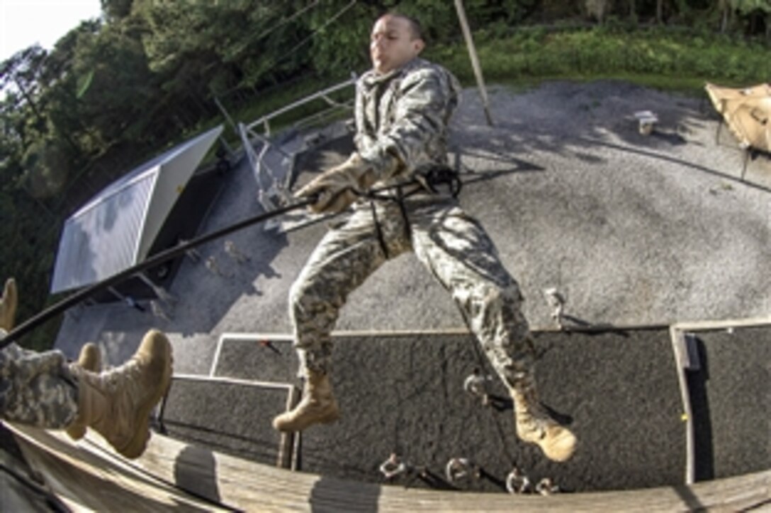 A chaplain candidate in a leaders course rappels during certification on Victory Tower as part of two weeks of annual training on Fort Jackson, S.C., May 29, 2015.