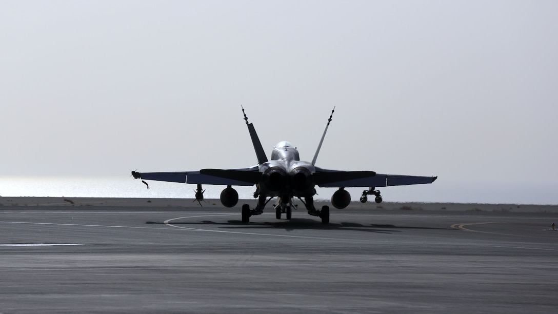 A U.S. Marine Corps F/A-18 Hornet from Marine Fighter Attack Squadron 232, Special Purpose Marine Air-Ground Task Force-Crisis Response-Central Command, maneuvers down the runway in preparation for a strike mission in Southwest Asia, May 28, 2015. Pilots of VMFA-232 support Combined Joint Task Force – Operation Inherent Resolve with a combination of surveillance flights and kinetic strike missions enabling Iraqi Security Forces in their fight against the Islamic State of Iraq and the Levant.