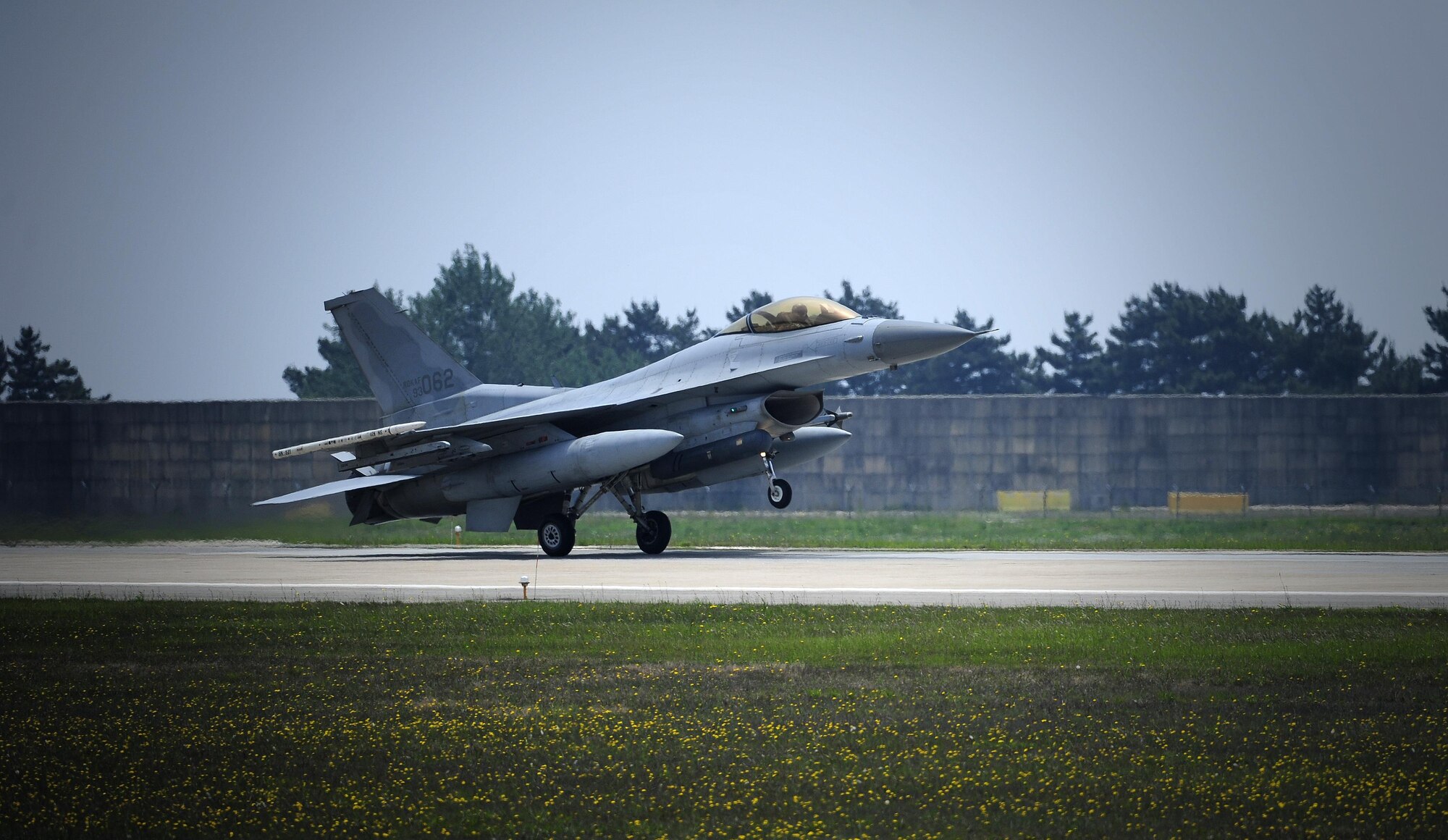 A South Korean air force F-16 Fighting Falcon from the 123rd Tactical Fighter Squadron arrives at Kunsan Air Base, South Korea, for exercise Buddy Wing 15-4, June 1, 2015. South Korean pilots routinely train with U.S. Air Force pilots to enhance interoperability and sharpen their combined airpower skills during Buddy Wing exercises multiple times throughout the year. (U.S. Air Force photo/Staff Sgt. Nick Wilson)