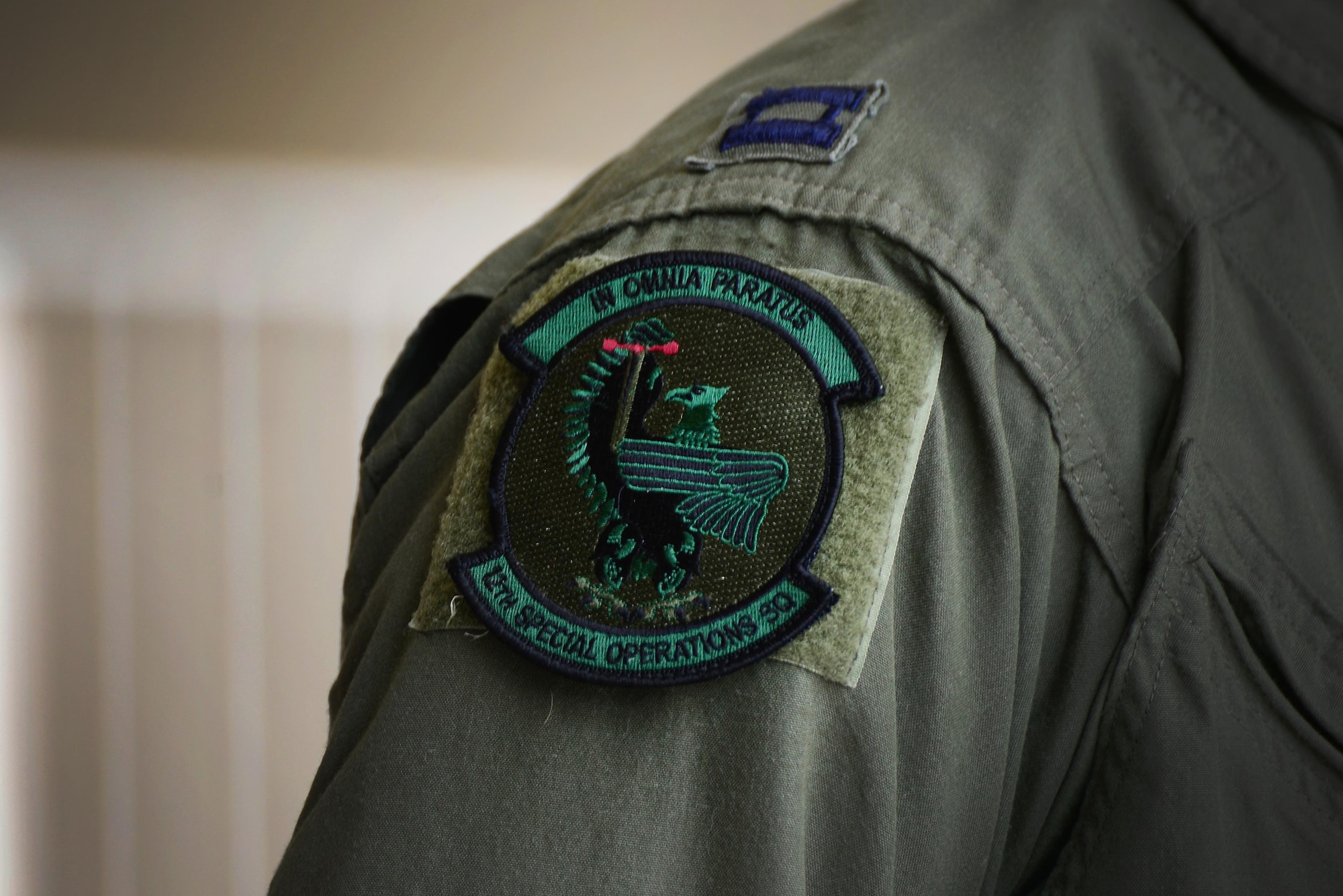 The 12th Special Operations Squadron patch rests on the flight suit of members of the newly re-designated unit for the first time May 28, 2015 at Cannon Air Force Base, N.M. The patch reads “In Omnia Paratus,” a Latin phrase meaning “ready for anything.” (U.S. Air Force Photo/Airman 1st Class Shelby Kay-Fantozzi)