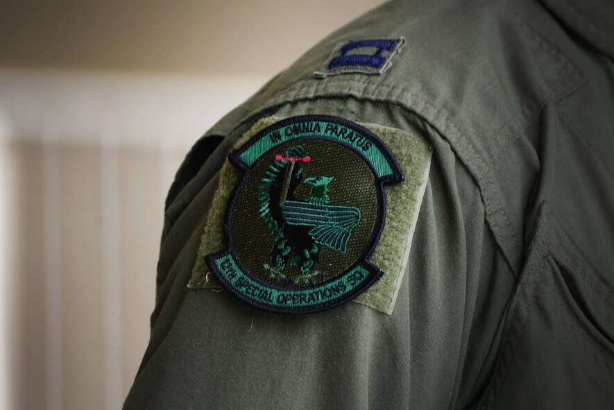 The 12th Special Operations Squadron patch rests on the flight suit of members of the newly re-designated unit for the first time May 28, 2015 at Cannon Air Force Base, N.M. The patch reads “In Omnia Paratus,” a Latin phrase meaning “ready for anything.” (U.S. Air Force Photo/Airman 1st Class Shelby Kay-Fantozzi)