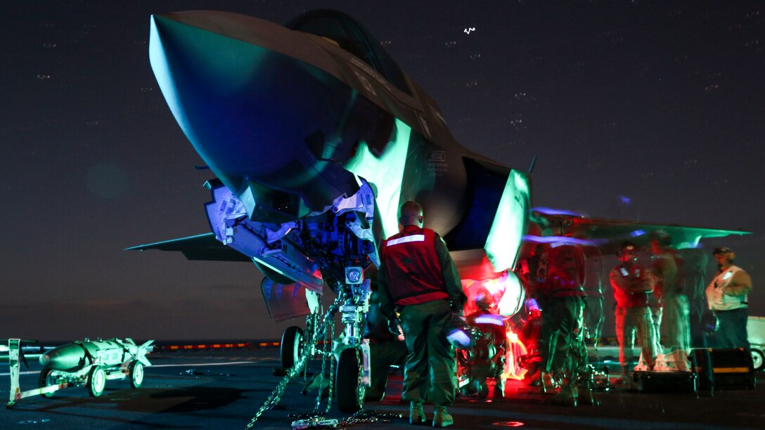 Marines load ordnance onto an F-35B Lightning II during Operational Testing 1 aboard USS Wasp at sea, May 27. Marines and sailors have been working together since May 18 to assess the integration of the F-35B Lightning II, which is currently on track to replace the F/A-18 Hornet, AV-8B Prowler, and the AV-8B Harrier. By the end of the testing period on May 29, U.S. Marine pilots had flown 110 F-35B sorties from USS Wasp, racking up more than 85 flight hours.
