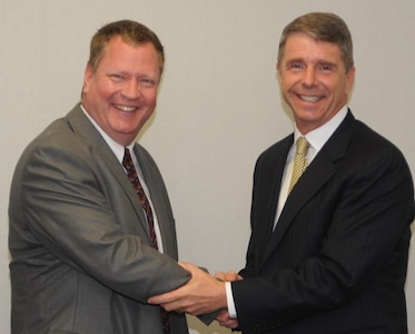 U.S. Rep. Rob Wittman (R-VA) congratulates Naval Surface Warfare Center Dahlgren Division (NSWCDD) scientist Steve Anderson for his NATO Science and Technology Organization's Scientific Achievement Award May 18.  