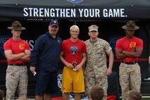 Marines from Recruiting Station Indianapolis and Marine Corps Recruit Depot San Diego from healped lead in the RS Indianapolis Semper Fidelis All-American Football Camp at Decatur Central High School's May 31, 2015.
Alex Fabert was awarded a leadership award during the camp by (left-to-right) SSgt Berryhill, Coach Caz Kosciolek, Captain Matthew A. Lamb and SSgt Jones.
