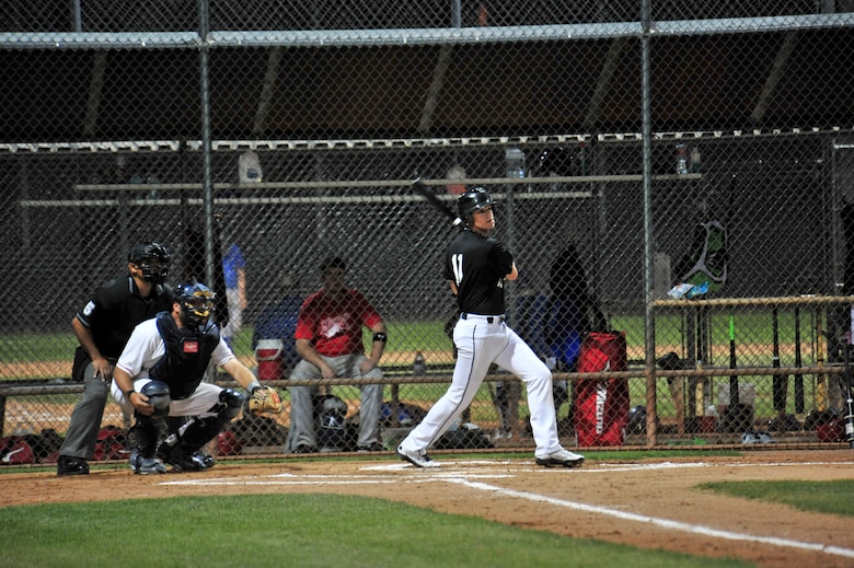 U.S. Air Force Senior Airman Russell LewisPablo, 25th Operational Weather Squadron weather forecaster and resource protection specialist, hits a ball into the outfield during a baseball game at Reid Park, Tucson, Ariz., April 10, 2015. LewisPablo was selected to play with the U.S. Military All-Stars, a baseball team made up of U.S. service members. (U.S. Air Force photo by Airman 1st Class Chris Massey/Released)